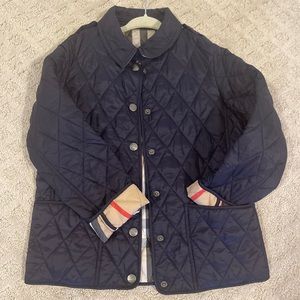 Burberry children’s quilted Navy coat. Size 7Y. Unisex. Barely worn.